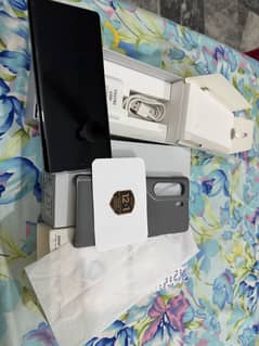 Tecno camon 40 pro just 15 days used available with box all assceries