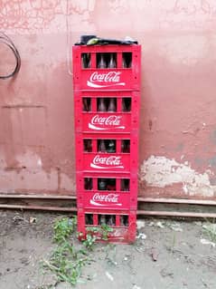 Coca Cola Crate with mix bottles for sale.
