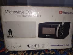 urgent sale Dawlance microwave oven new hai used NAHI kia