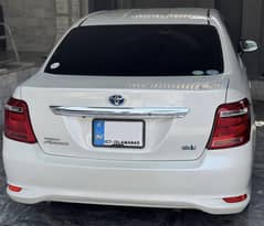 Toyota Corolla Axio Hybrid Pearl White