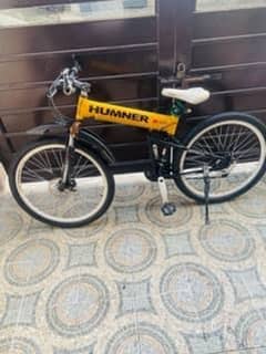 hummer cycle pics se ziada modified hai or wheel bhi bre lge hain