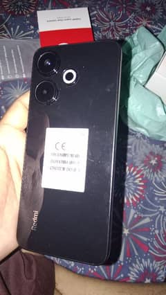 Redmi 13 mobile ha bhai okay black color ha new mobile ha