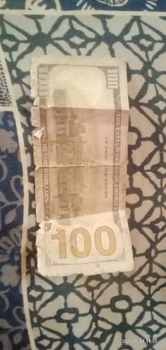 100 US dollar thora phata wa he jaisa pic me he