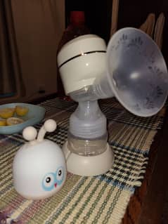 roots electric breast pump brand new