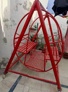 Jhola playing