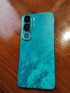 Vivo y 200 brand new. One week used. Didn't like green color.