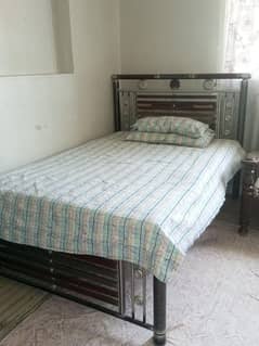 single iron bed