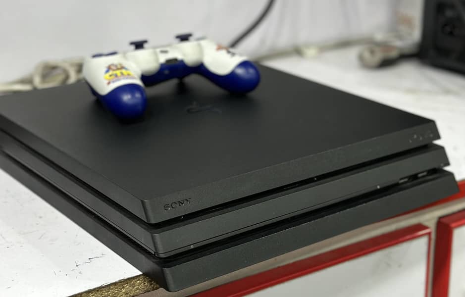 Ps4 pro 1tb with 1 controller in immaculate condition 0