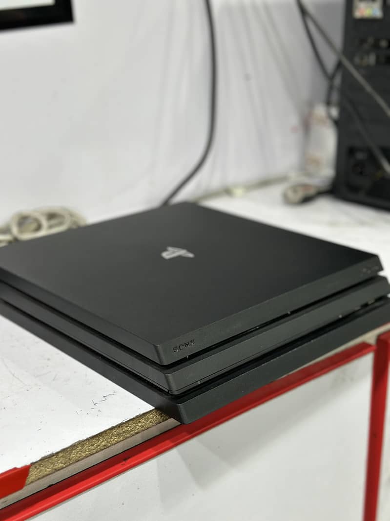 Ps4 pro 1tb with 1 controller in immaculate condition 1