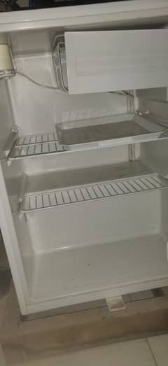 Almost new mini Haier fridge with mini freezer for sale in b-17.