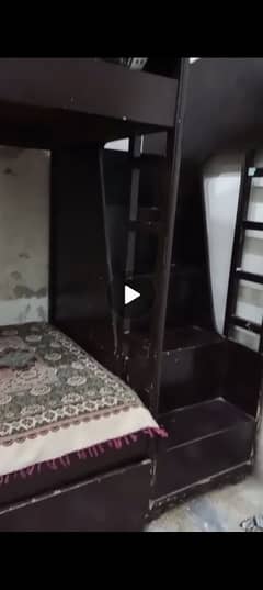 wooden double bed with wooden stairs