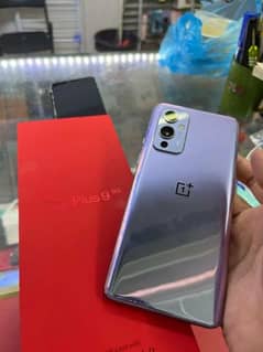 OnePlus 9 5G green line ha baki sab ok no fald Sath men chargr ha