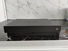 Xbox one x 1 TB storage with digital games included (Bought from US)