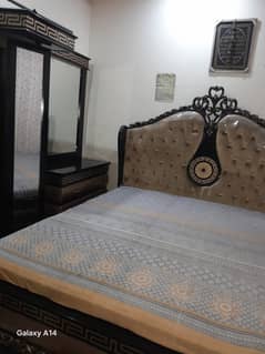 Bed with side tables and dressing