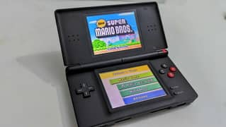 Nintendo DS lite Excellent condition + New R4 card + 64gb Loaded games