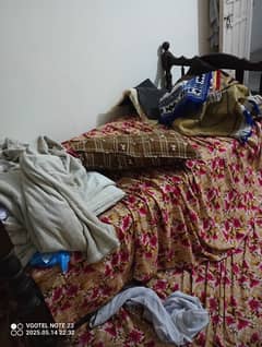 wooden bad with mattress