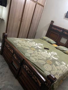 Double bed with spring metress and dressing table