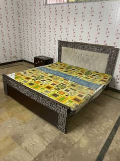 Bed with mattress