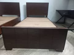 3 single beds with 2 side table