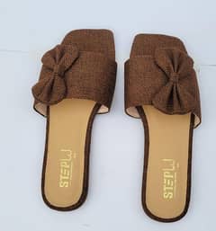 Elegant women's brown Rexine flats