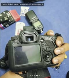 Canon 6d with canon 35-80mm and speed light