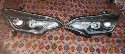 Honda fit hybrid headlights like new.