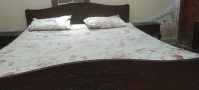 Bed with two side table and dressing table