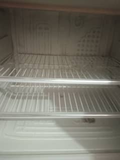 Dawlance refrigerator with stabilizer