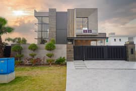 One Kanal Brand New Luxury Ultra-Modern Design Most Beautiful Bungalow 2 Servant Quarter In Basement For Sale At Prime Location Of DHA Lahore Near To Park Majid Petrol pump & Commercial Market.