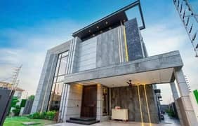 One Kanal Brand New Luxury Ultra-Modern Design Most Beautiful Bungalow 2 Servant Quarter In Basement For Sale At Prime Location Of DHA Lahore Near To Park & Commercial Market.