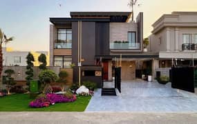 One Kanal Brand New Luxury Ultra-Modern Design Most Beautiful Full Basement Semi Furnished Home Theater Swimming Pool 15Kv Solar Attached Bungalow Roof Top Garden For Sale At Prime Location Of DHA Lahore Near To Park Masjid & Commercial Market.