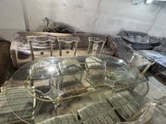 8 chair dining table in deco and acrylic work with top glass