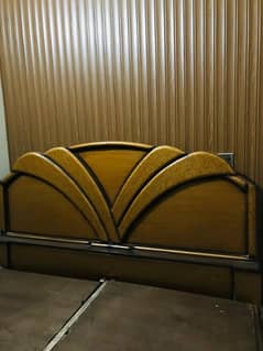 wooden bed in good condition