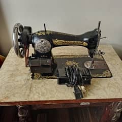 Singer sewing machine available.