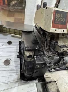 Jucki Over lac machine model number 2304