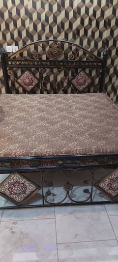 used double bed with spring mattress