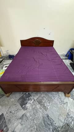 wooden double bed