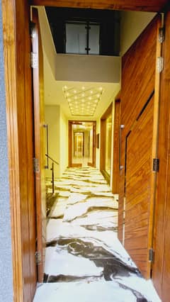 10 Marla luxury Brand New House Available For Sale In Babar Block Bahria Town Lahore