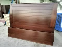 king size bed with dressing and sidetables