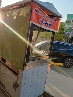 fast food berger shawarma ka stall ha Jo pics man ha vo he idr b ha