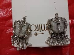 Earrings by Almirah