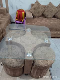 four seater puffy and table
