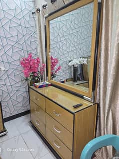 Dressing table with king size bed with side tables