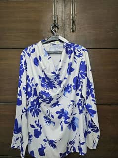 Green shirt is new from Almas