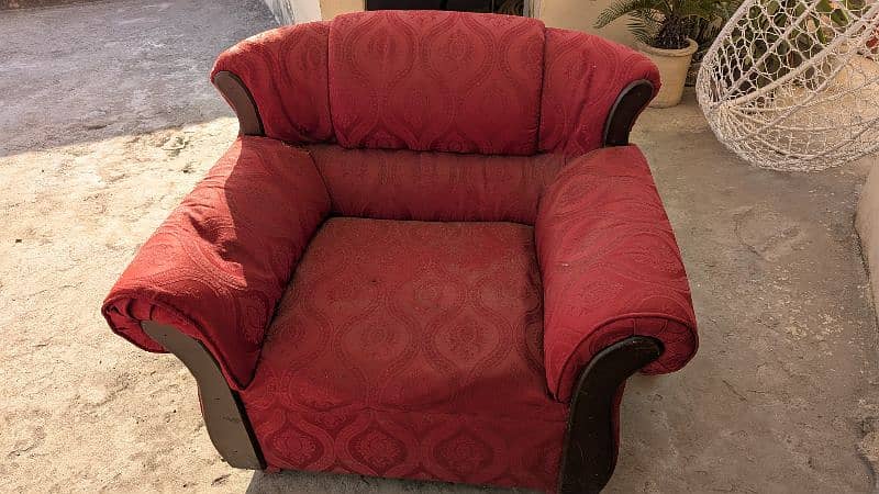 Two single seater sofa and two tables 1 small 1 medium 1