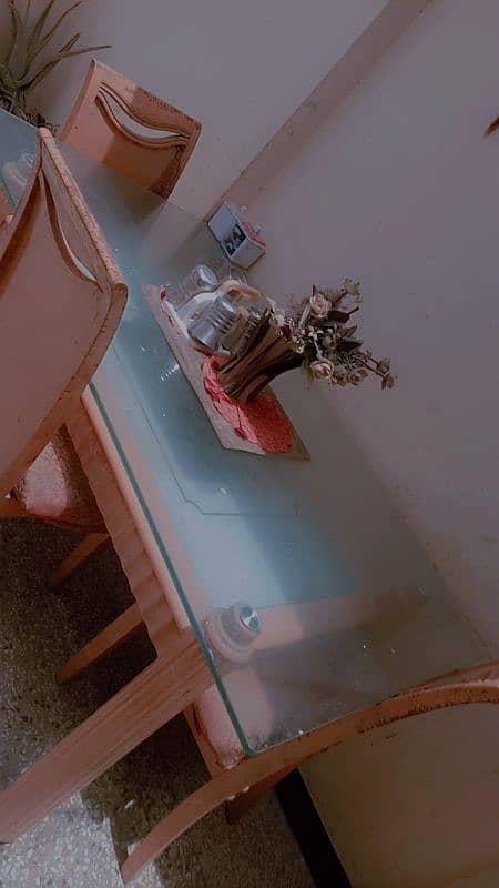 full size table with 4 chairs in good condition 0