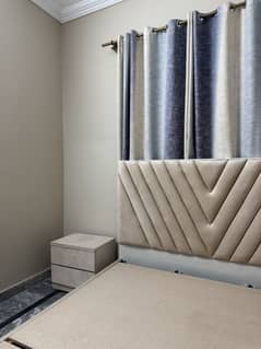 Double bed with side tables