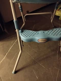 eating sitting baby high chair