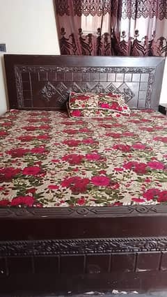wooden double bed
