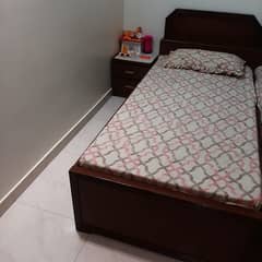 Bed and side table